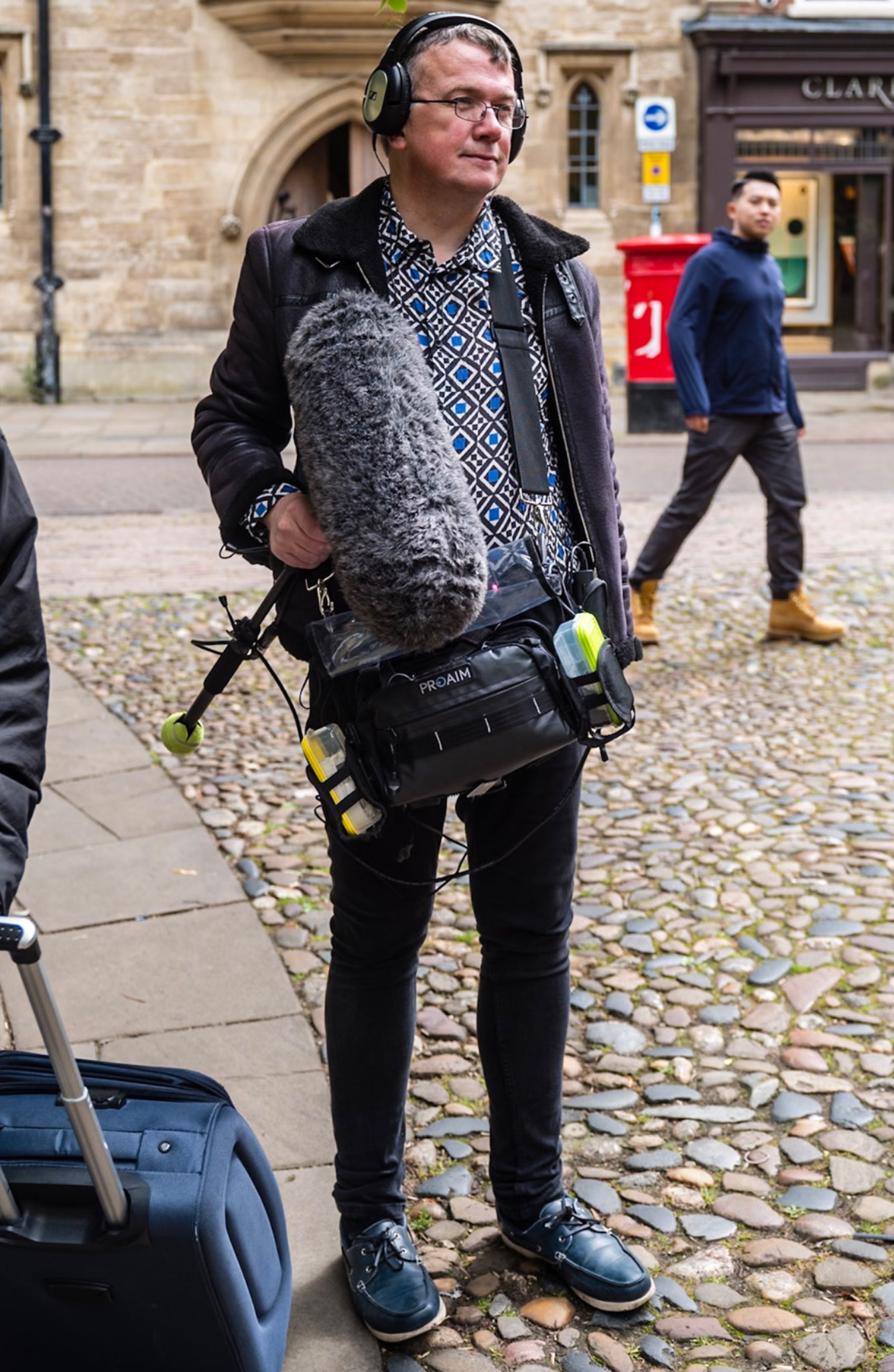 Martin Edwards working as a boom operator on location